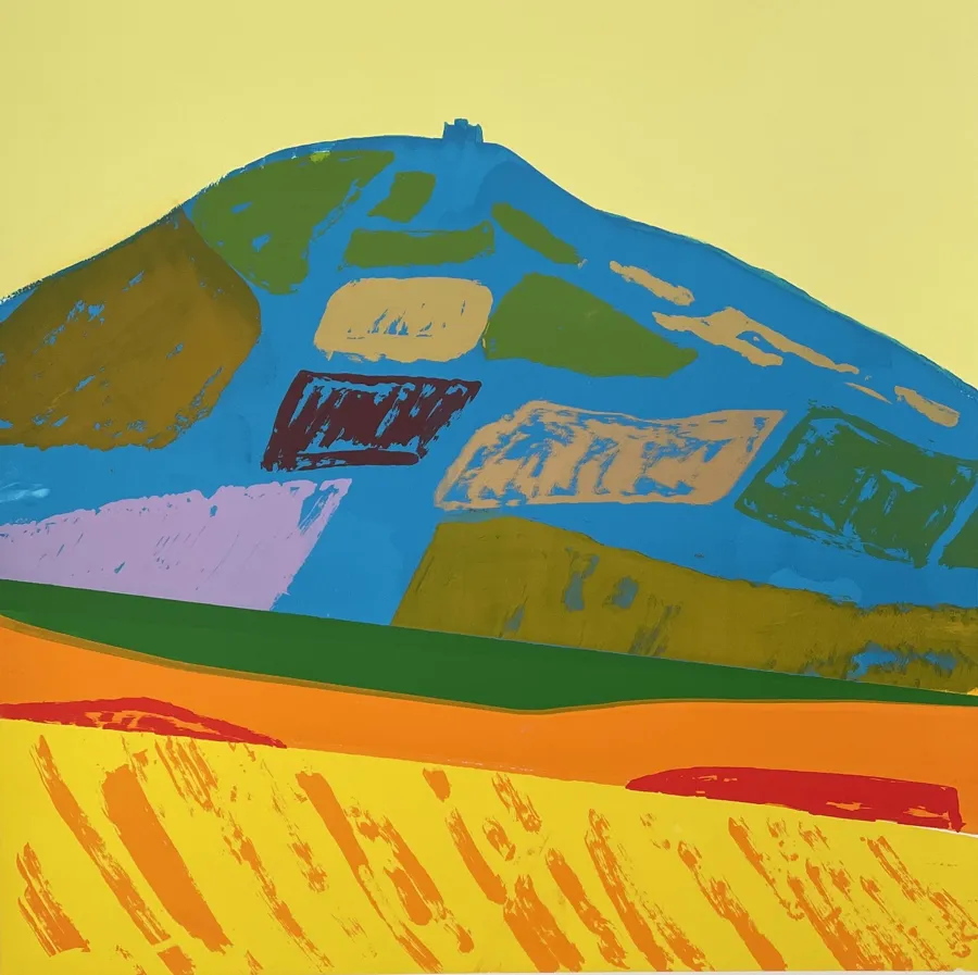 Painterly landscape of a blue hill with patches of green, purple and red over a yellow field